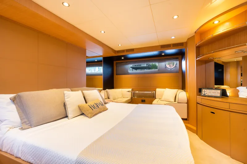  Yacht Photos Pics Luxurious bedroom interior of 2012 Riva 75 Venere yacht with modern furnishings.