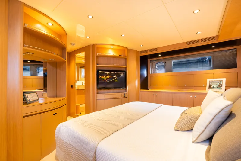  Yacht Photos Pics Luxurious master bedroom on 2012 Riva 75 Venere yacht with modern wooden interior.