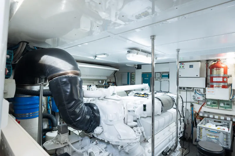 Yacht Photos Pics Engine room of a 2012 Riva 75 Venere yacht with visible machinery and equipment.