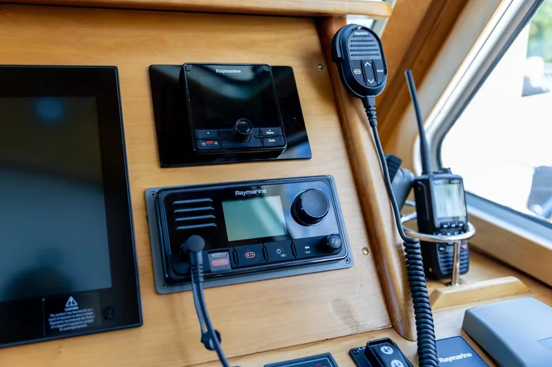  Yacht Photos Pics Control panel of a 2009 Sabre 52 Express yacht with navigation equipment.