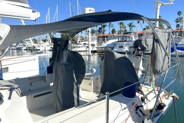 Resolute Yacht Photos Pics Sailboat Blue Jacket 40, 2015 model, docked in marina with protective covers.