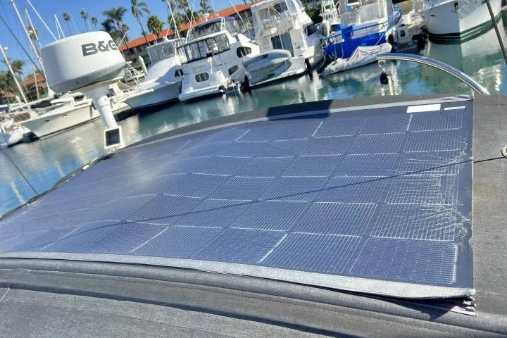 Resolute Yacht Photos Pics Solar panels on a 2015 Blue Jacket 40 sailboat docked in a marina.