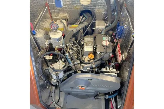 Resolute Yacht Photos Pics Engine compartment of a 2015 Blue Jacket 40 sailboat, showcasing detailed mechanical components.