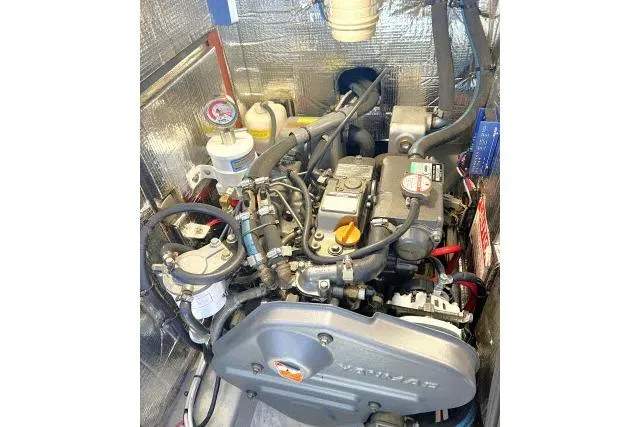 Resolute Yacht Photos Pics Engine compartment of a 2015 Blue Jacket 40 sailboat, featuring a Yanmar engine.