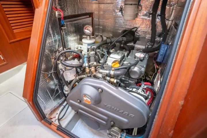 Resolute Yacht Photos Pics Engine compartment of a 2015 Blue Jacket 40 sailboat, featuring a Yanmar engine.