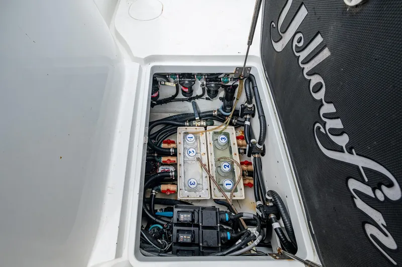  Yacht Photos Pics 2013 Yellowfin 39 Offshore boat electrical compartment with wiring and components.