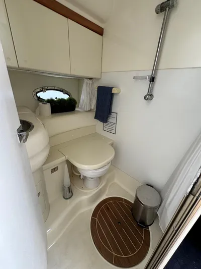  Yacht Photos Pics Bathroom interior of 2003 Cranchi Endurance 39 yacht, featuring toilet and shower.