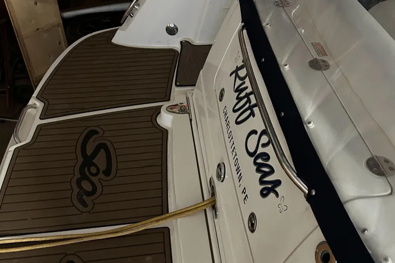  Yacht Photos Pics 2005 Sea Ray 390 Sundancer boat with custom "Ruff Seas" nameplate, docked in Charlottetown, PE.