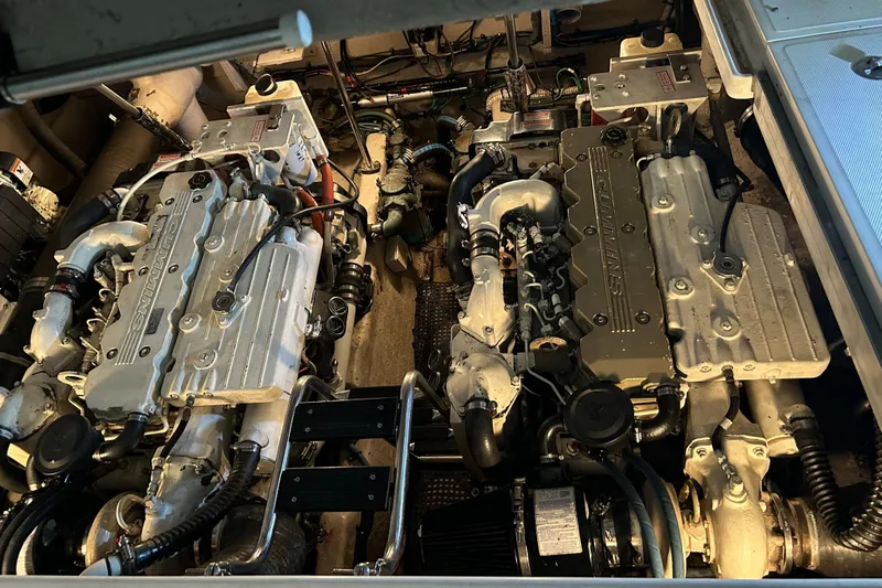  Yacht Photos Pics Engine room of 2005 Sea Ray 390 Sundancer with dual engines visible.