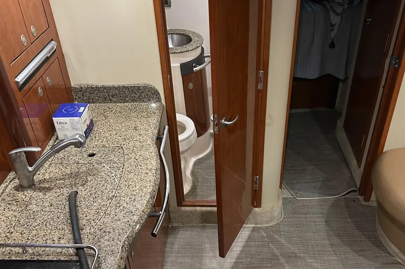  Yacht Photos Pics 2005 Sea Ray 390 Sundancer interior with granite countertop and bathroom view.