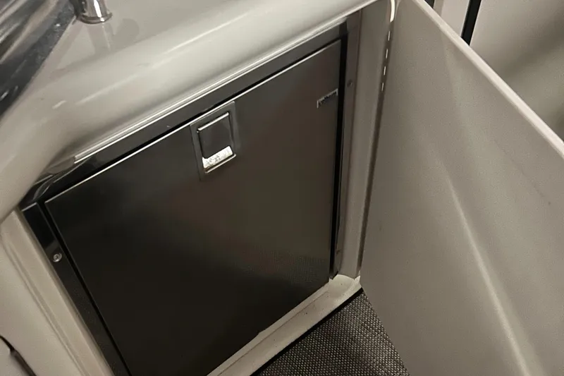  Yacht Photos Pics 2005 Sea Ray 390 Sundancer interior with built-in stainless steel refrigerator.