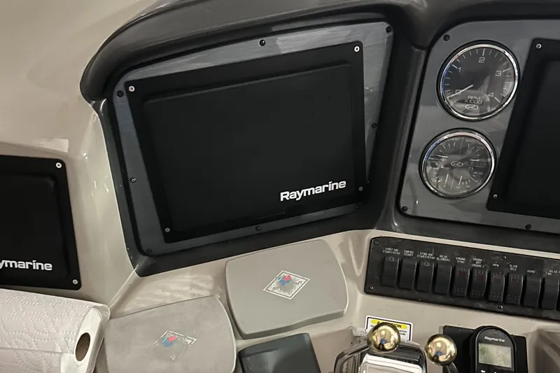  Yacht Photos Pics Control panel of 2005 Sea Ray 390 Sundancer with Raymarine navigation system.