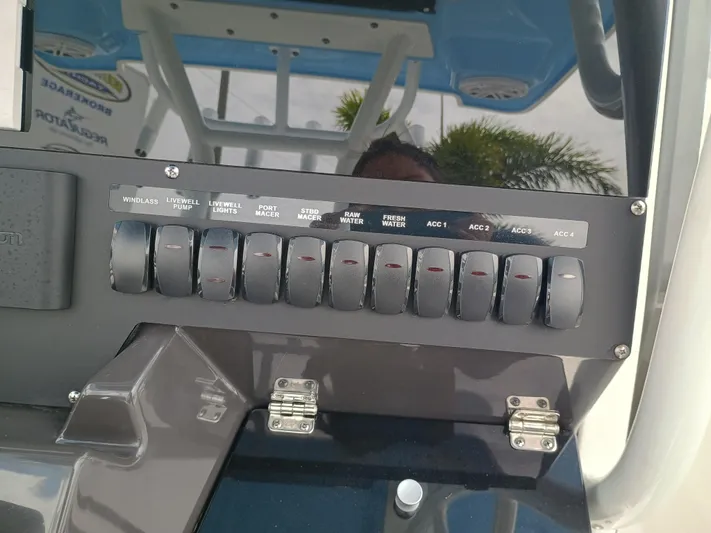 272-499 Yacht Photos Pics Control panel of 2025 Blackfin 272 CC boat with labeled switches.