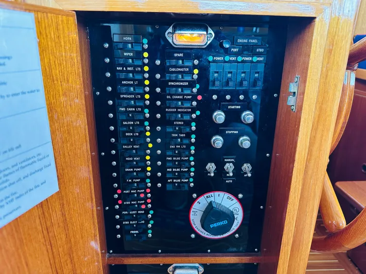 Liberty Yacht Photos Pics Electrical panel of a 2003 Grand Banks 46 Europa yacht, featuring switches and indicators.