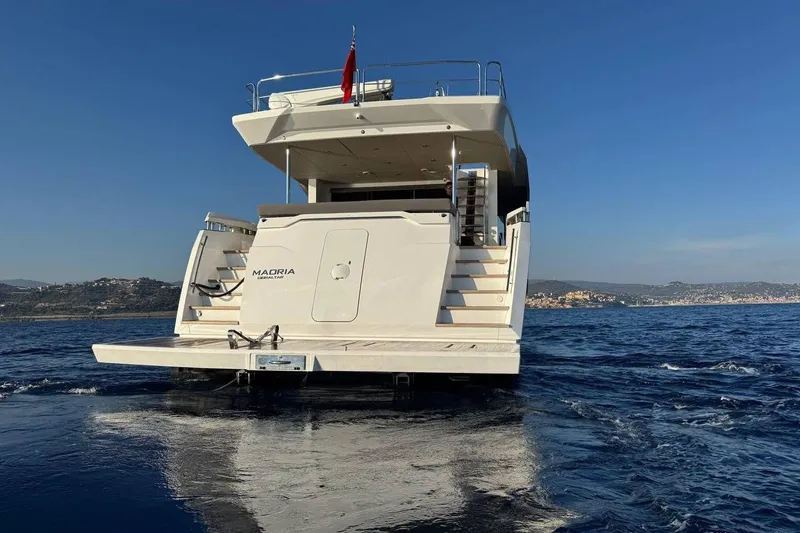 Maoria Yacht Photos Pics Luxury Numarine 26XP yacht cruising on open water, 2021 model.