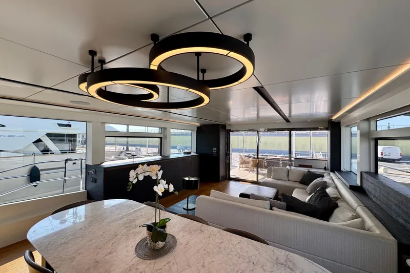 Maoria Yacht Photos Pics Luxurious interior of 2021 Numarine 26XP yacht with modern lighting and elegant furnishings.