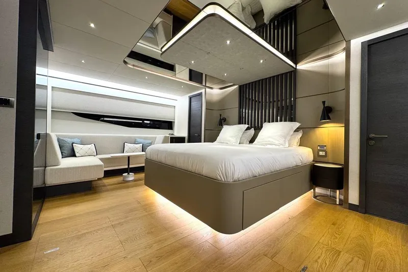 Maoria Yacht Photos Pics Luxurious interior of 2021 Numarine 26XP yacht with modern bedroom and seating area.