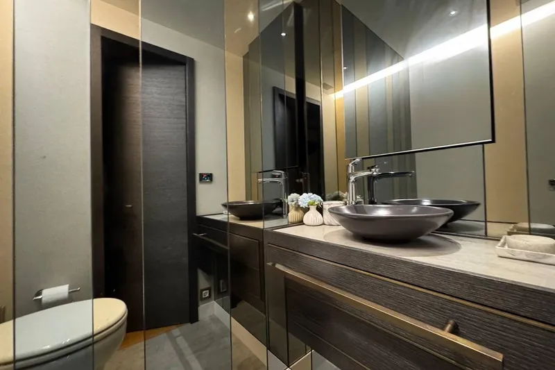 Maoria Yacht Photos Pics Luxurious bathroom interior of 2021 Numarine 26XP yacht with modern fixtures and elegant design.