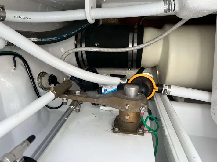  Yacht Photos Pics Engine compartment of 2022 Henriques 42 Express Hardtop with visible hoses and mechanical components.