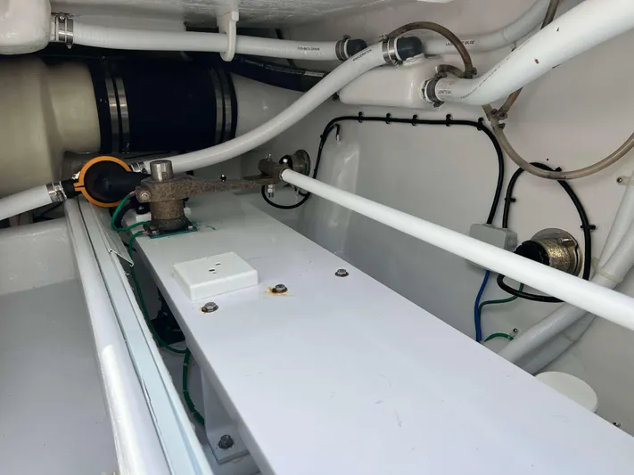  Yacht Photos Pics Engine room of 2022 Henriques 42 Express Hardtop with visible pipes and fittings.