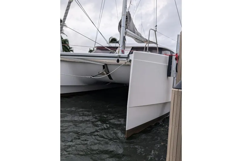 Sea Hugger Yacht Photos Pics 2016 Nautitech 40 Open catamaran docked, showcasing sleek hull design.