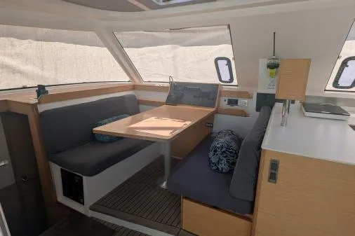 Sea Hugger Yacht Photos Pics Interior of 2016 Nautitech 40 Open catamaran with modern seating and dining area.