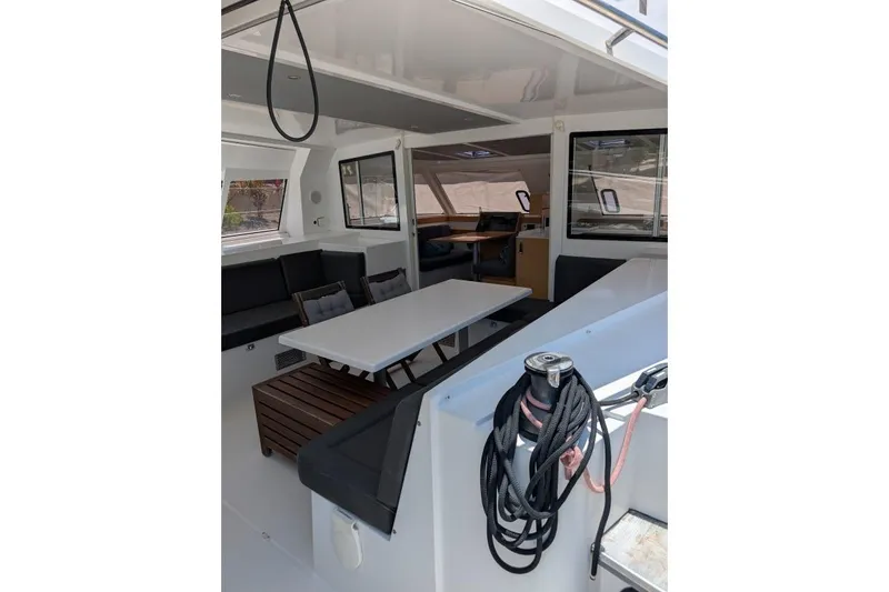 Sea Hugger Yacht Photos Pics Interior of 2016 Nautitech 40 Open catamaran with seating and dining area.