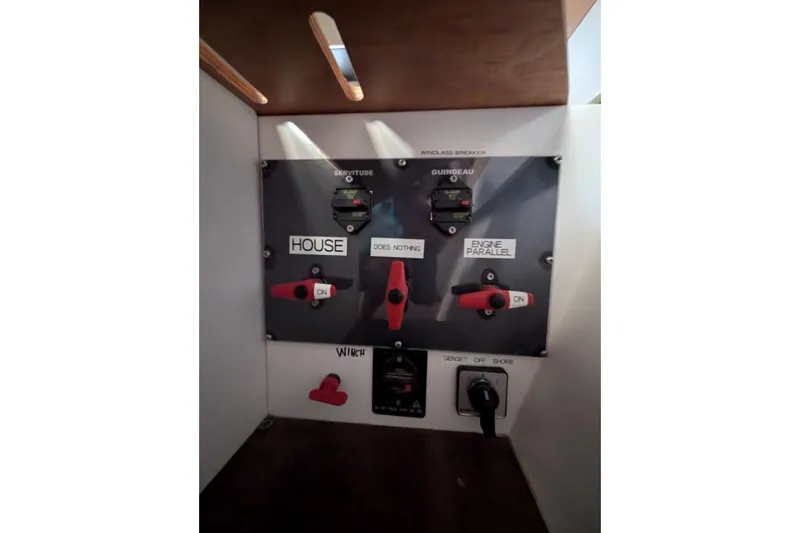 Sea Hugger Yacht Photos Pics Control panel of a 2016 Nautitech 40 Open catamaran with switches and labels.
