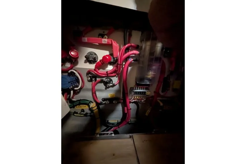 Sea Hugger Yacht Photos Pics Electrical system of a 2016 Nautitech 40 Open catamaran with red and black wiring.