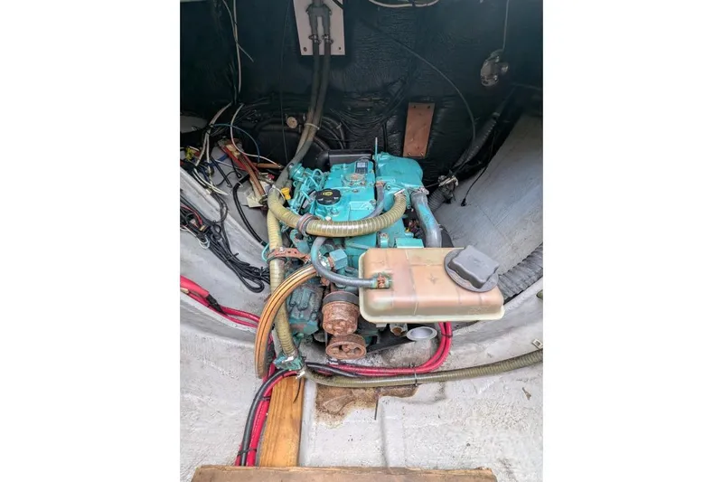Sea Hugger Yacht Photos Pics Engine compartment of a 2016 Nautitech 40 Open catamaran, showcasing mechanical components.