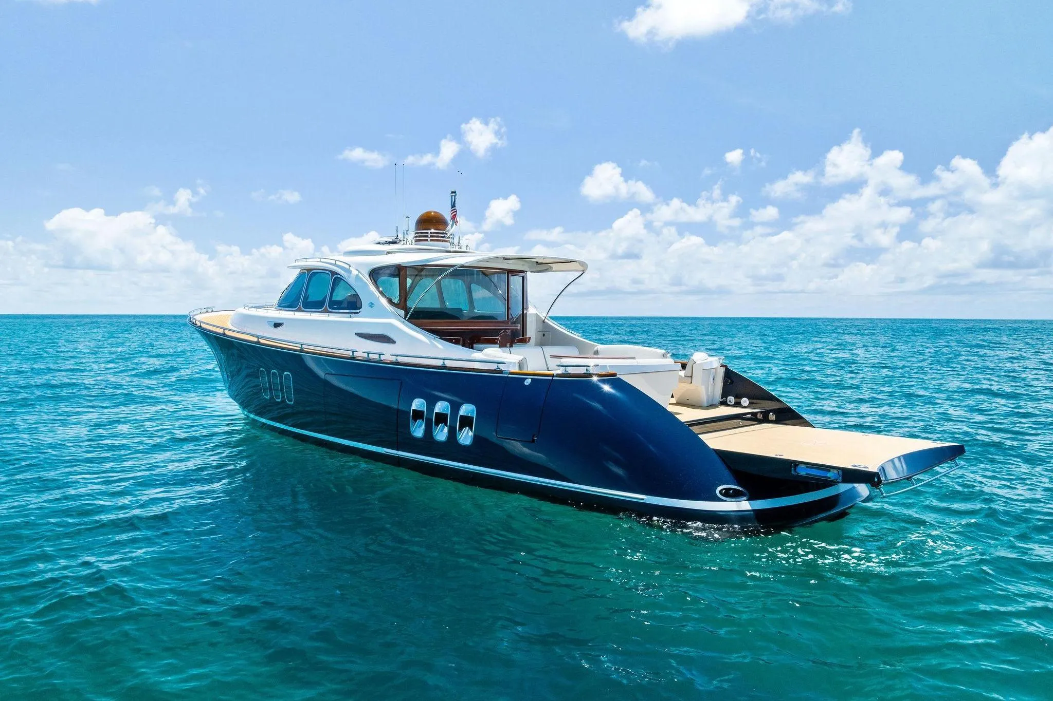2019 Zeelander Z55 yacht cruising on clear blue ocean waters.