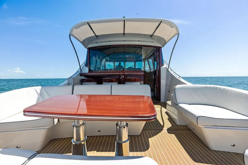 Dutch Yacht Photos Pics Luxurious 2019 Zeelander Z55 yacht with elegant seating and wooden table on deck.