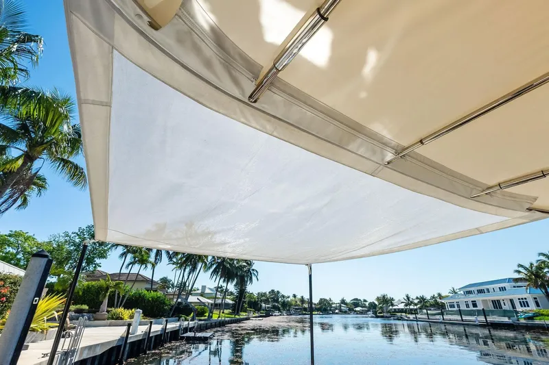 Dutch Yacht Photos Pics 2019 Zeelander Z55 yacht canopy with waterfront view and palm trees.