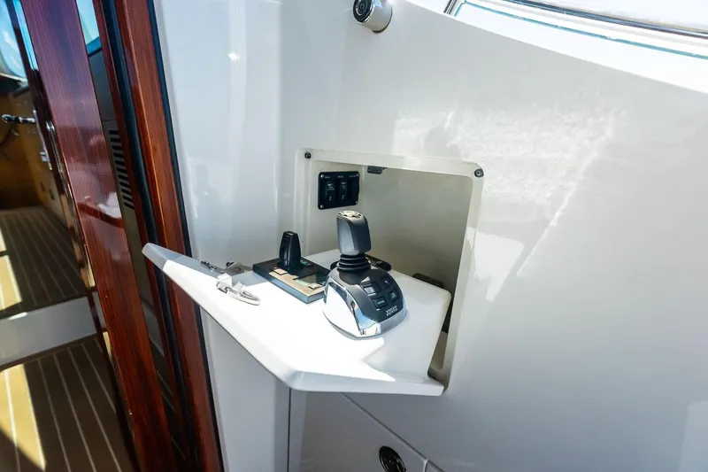 Dutch Yacht Photos Pics Control panel of 2019 Zeelander Z55 yacht with joystick and keys.