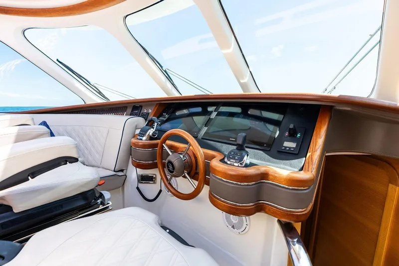 Dutch Yacht Photos Pics Luxurious 2019 Zeelander Z55 yacht helm with elegant wood and leather detailing.