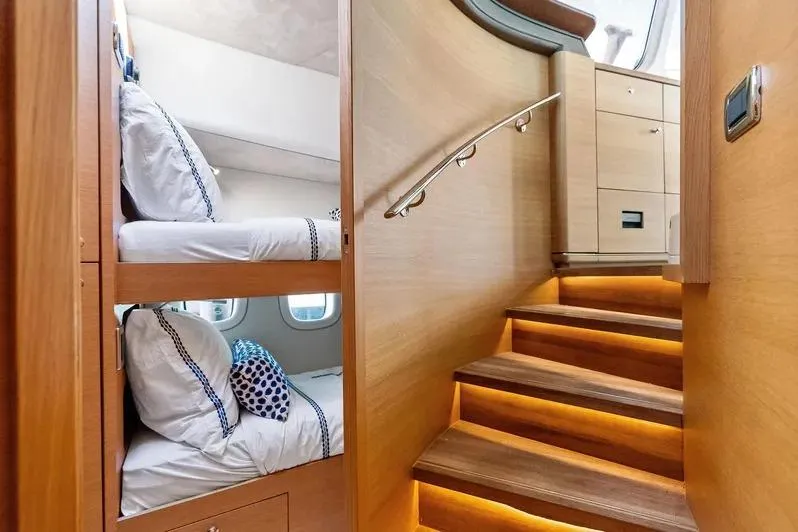 Dutch Yacht Photos Pics Luxurious 2019 Zeelander Z55 yacht interior with wooden stairs and cozy bunk beds.