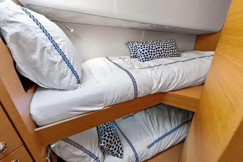 Dutch Yacht Photos Pics Bunk beds in 2019 Zeelander Z55 yacht cabin with polka dot pillows.