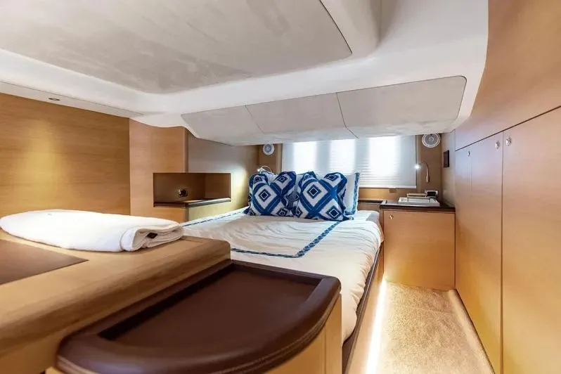 Dutch Yacht Photos Pics Luxurious cabin interior of 2019 Zeelander Z55 yacht with modern design and cozy bedding.