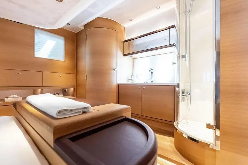 Dutch Yacht Photos Pics Luxurious interior of 2019 Zeelander Z55 yacht with elegant wood finishes and modern amenities.