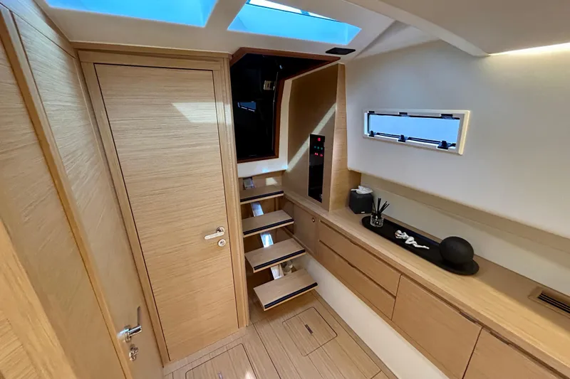 Odessa Mama Yacht Photos Pics Luxurious interior of 2023 Pardo Yachts 43, featuring modern wood finishes and sleek design.