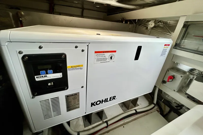 Odessa Mama Yacht Photos Pics Kohler generator in 2023 Pardo Yachts 43 engine room, showcasing advanced digital control.