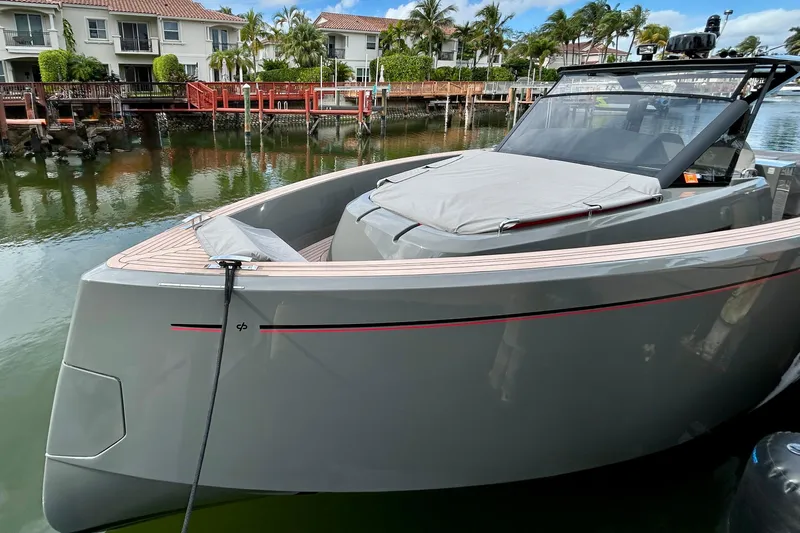 Odessa Mama Yacht Photos Pics 2023 Pardo Yachts 43 docked near waterfront homes, showcasing sleek design and modern features.