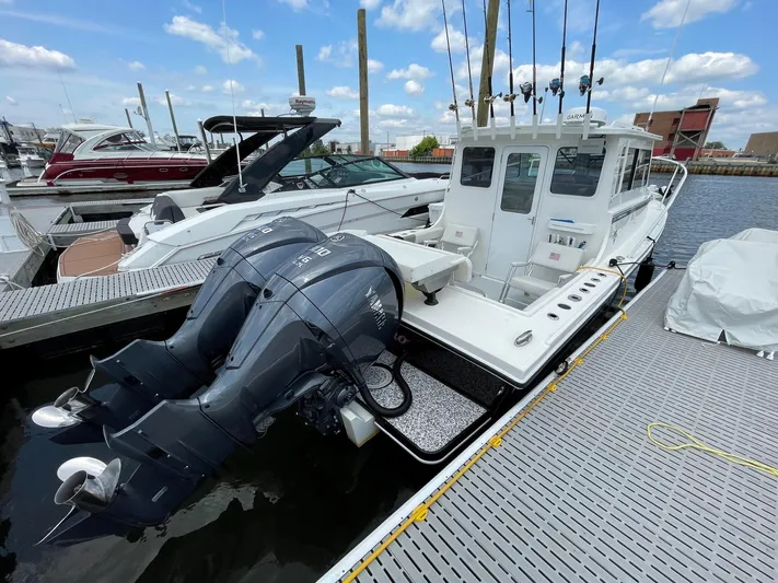  Yacht Photos Pics 2021 Steiger Craft 28 DV Chesapeake boat docked with twin Yamaha engines.