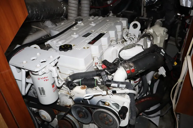  Yacht Photos Pics Engine room of 2006 Bluewater Yachts 5200, showcasing detailed mechanical components and systems.