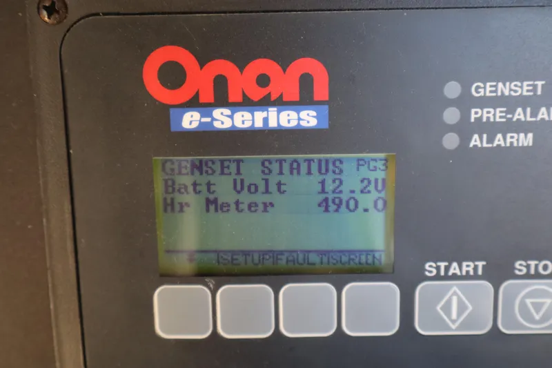  Yacht Photos Pics Onan e-Series generator display showing battery voltage and hour meter for 2006 Bluewater Yachts 5200.