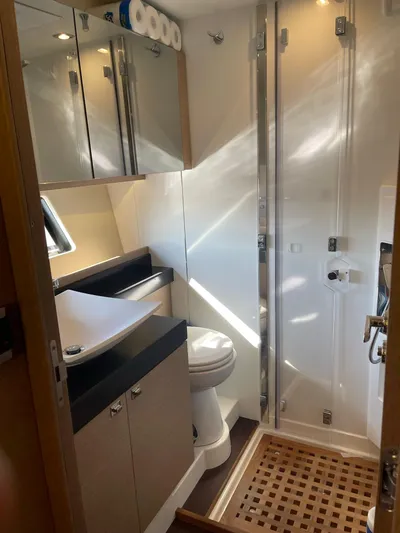  Yacht Photos Pics Luxurious bathroom in 2018 Prestige 500 S yacht with modern fixtures and elegant design.