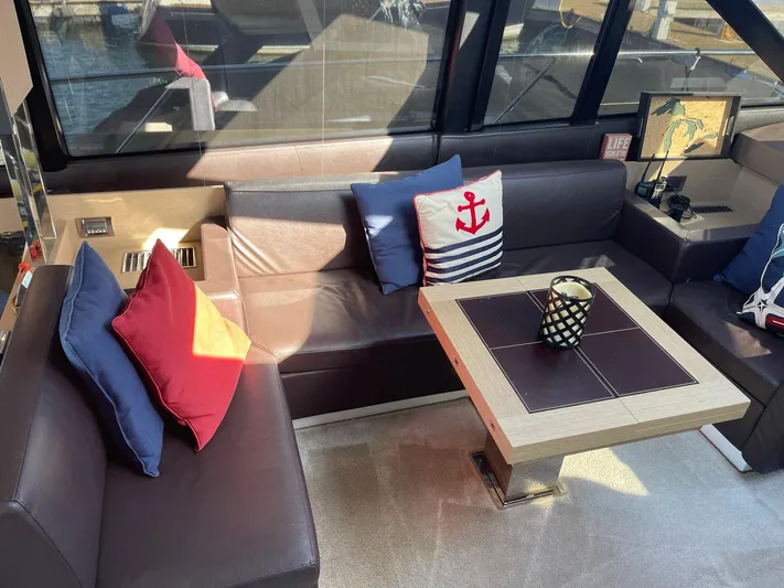  Yacht Photos Pics Luxurious 2018 Prestige 500 S yacht interior with nautical-themed cushions and modern decor.