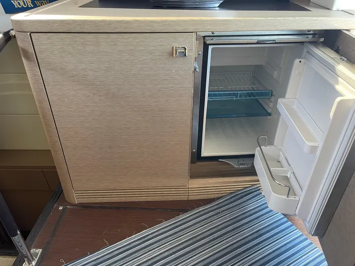 Yacht Photos Pics Compact refrigerator in a 2018 Prestige 500 S yacht kitchen area.