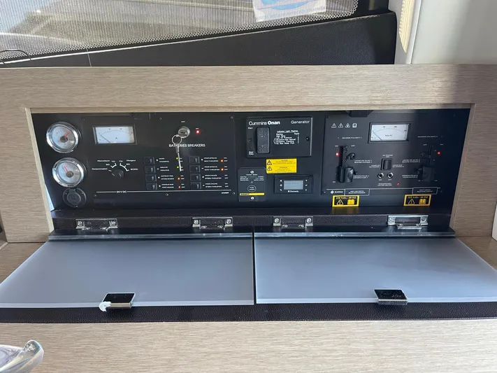  Yacht Photos Pics Control panel of a 2018 Prestige 500 S yacht, featuring gauges and switches.