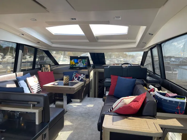  Yacht Photos Pics Luxurious interior of a 2018 Prestige 500 S yacht with modern seating and decor.